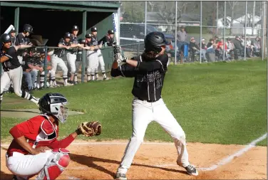  ?? Terrance Armstard/News-Times ?? Awaiting the pitch: Smackover's Noah Wilson waits for a pitch to be thrown during the Bucks' game against Lake Village during the regular season. Today, Smackover takes on Fouke in the opening round of the 4-3A Regional Tournament at Horatio. Game time...