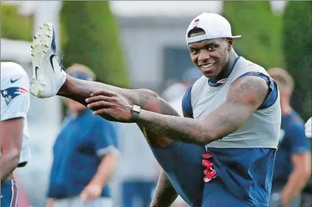  ?? ELISE AMENDOLA/AP PHOTO ?? Patriots wide receiver Josh Gordon warms up prior to the start of Monday’s practice session in Foxborough, Mass.