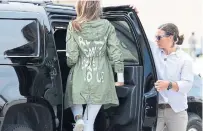  ?? CHIP SOMODEVILL­A ?? Melania Trump wore a jacket reading “I Really Don’t Care, Do U?” while en route to visiting a detention centre for immigrant children.