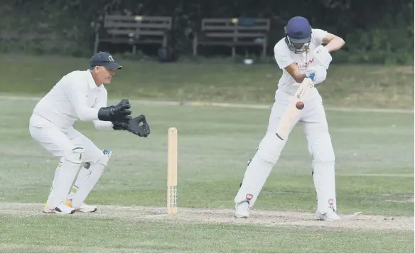  ??  ?? Sunderland batsman Zarheer Shabaz batting against Crook at Ashbrooke, watched by wicket-keeper Andrew Pratt.