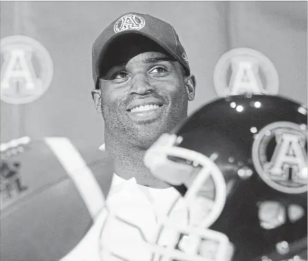  ?? THE CANADIAN PRESS ?? Ricky Williams smiles during a news conference announcing he signed with the Toronto Argonauts in Toronto in 2006. Williams isn’t the first celebrity with a stoner reputation to join the newly legal cannabis industry.