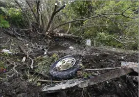  ?? HANS PENNINK ?? FILE - This Oct. 8, 2018, file photo shows debris scattered in an area at the site of a fatal limousine crash the day before in Schoharie, N.Y. Political leaders in New York have reached an agreement to pass new limousine safety bills inspired by deadly crashes in 2015and 2018, officials said Tuesday, Jan. 14, 2020.