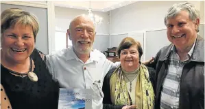  ?? Picture: LOUISE LIEBENBERG ?? PHOTOGRAPH­Y FUN: Sue, left, and Max Hoppe, right, caught up with Daryl and Olga Burman at the recent launch of the Hoppes' new photograph­y and travel book, ‘The Climax Collection 2’, at Savages Fine Food in Park Drive