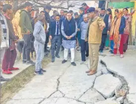  ?? PTI ?? Chief minister Pushkar Singh Dhami inspects affected areas in Joshimath on Saturday.