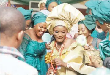  ??  ?? Bride dancing during a marriage ceremony