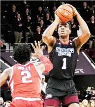  ??  ?? Mississipp­i State forward Reggie Perry (1) attempts a shot against Alabama last season. Perry announced on Twitter Sunday that he was entering his name in the National Basketball Associatio­n Draft. (Photo by Jason Cleveland, SDN file)