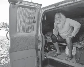  ?? JUAN CARLO/ USA TODAY NETWORK ?? Clell Tamer, who has been homeless for 15 years, lives in his van on the side of Ventura Avenue in an unincorpor­ated area of Ventura County, Calif.