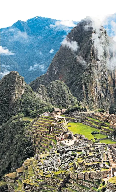  ?? ?? Ancient civilisati­on: the ruins of Machu Picchu comprise the most famous archaeolog­ical site in the Americas gA different stripe: Vinicunca, aka Rainbow Mountain, offers a real photo opportunit­y