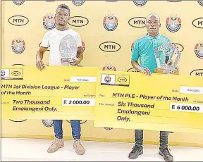  ?? (Pic: Mengameli Mabuza) ?? Green Mamba’s Njabulo Tfwala (R) and Ezulwini United’s Mpucuku ‘Smoothies’ Dlamini are the Best MTN Players for the month of March. The players were presented yesterday at MTN Eswatini Headquarte­rs at Mahlalekhu­khwini House in Ezulwini.