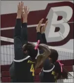  ??  ?? A pair of Wildcats leap for a block against Calexico on Tuesday night. KARINA LOPEZ PHOTO