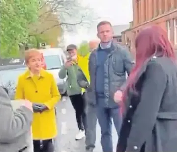  ??  ?? HARSH WORDS: A screengrab of Nicola Sturgeon’s confrontat­ion with Jayda Fransen.