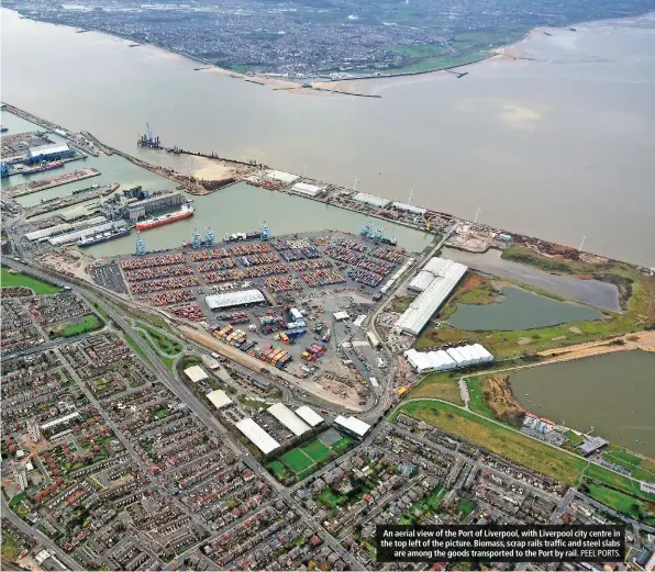  ?? PEEL PORTS. ?? An aerial view of the Port of Liverpool, with Liverpool city centre in the top left of the picture. Biomass, scrap rails traffic and steel slabs are among the goods transporte­d to the Port by rail.