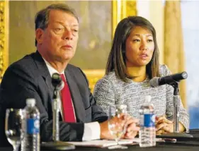  ?? THE ASSOCIATED PRESS ?? Crystal Pepper, daughter of Dr. David Dao, accompanie­d by attorney Stephen Golan, speaks at a news conference Thursday in Chicago.