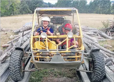  ??  ?? Rev it up: Alastair Paulin and a small suspect doing some precision driving at Wild Tracks at Stanley Brook, near Tapawera.