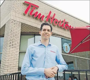  ?? CP PHOTO/FRANK GUNN ?? David Schwartz, Chief Executive Officer of Restaurant Brands Internatio­nal in an interview with The Canadian Press in Oakville, Ont.. The CEO of the parent company of Tim Hortons says he recently met with disgruntle­d franchisee­s who have formed a rogue...
