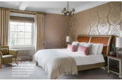  ??  ?? MAIN BEDROOM Gold-toned wallpaper adds to the luxe look. Hovingham wallpaper by Cole & Son, £97 a roll, Jane Clayton