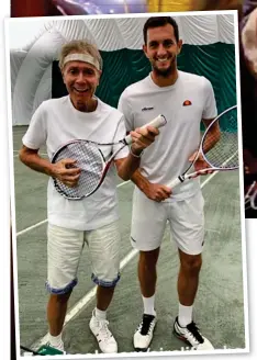  ?? ?? Playing it safe: Sir Cliff and tennis star James Ward under a rain-proof dome at Wimbledon