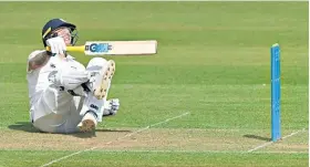  ?? ?? Attacking: Ben Stokes slips over while making 82 for Durham at Chester-le-street yesterday