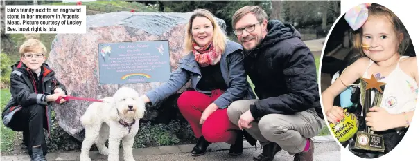  ??  ?? Isla’s family next to an engraved stone in her memory in Argents Mead. Picture courtesy of Lesley Bee. Inset right is Isla