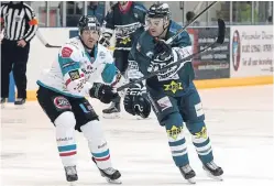  ?? Picture: Derek Black. ?? Stars’ Adam Harding tussles with Brandon Benedict in last night’s game in Dundee.