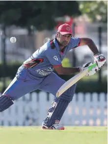  ?? Pawan Singh / The National ?? Asghar Stanikzai and Afghanista­n defeated the UAE despite a century from Shaiman Anwar