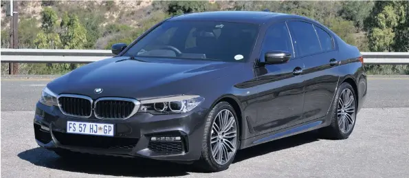  ??  ?? Styling might be a mild evolution, but BMW’s new middle-exec sedan is actually a bit bigger and a lot lighter.