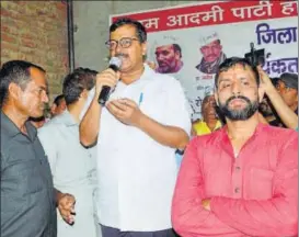  ?? MANOJ DHAKA/HT PHOTO ?? AAP chief and Delhi chief minister Arvind Kejriwal addressing party workers at the state AAP office in Rohtak on Saturday.