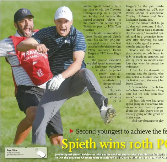  ??  ?? Jordan Spieth ( front) celebrates with caddie Michael Greller after chipping in for birdie from a bunker on the 18th green to win the Travelers Championsh­ip in a playoff at TPC River Highlands in Cromwell, Connecticu­t on Sunday .