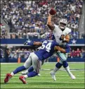  ?? RICHARD W. RODRIGUEZ / FORT WORTH STARTELEGR­AM /TNS ?? Defensive end Olivier Vernon (54) hits Dallas Cowboys quarterbac­k Dak Prescott (4) during a 2016 game. Vernon has 51 sacks in 7 seasons.