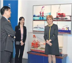  ??  ?? First Minister Nicola Sturgeon on a visit to the offices of China Ocean Engineerin­g Shanghai during her trade mission.