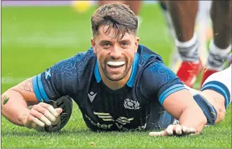  ?? ?? A big smile from Adam Hastings as he went over against Fiji at Murrayfiel­d