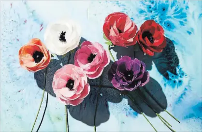  ?? KATE MATHIS THE WASHINGTON POST ?? Handmade paper anemones by Livia Cetti of the Green Vase.