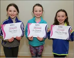  ?? ?? Beaming smiles from Grace Guerin, Cara Fitzpatric­k and Mary Jane Murphy with their certificat­es at the Knocknagre­e Ladies Football Club celebratio­n event in Cullen Community Centre