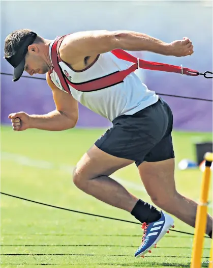  ??  ?? Power play: Ben Youngs trains in Miyazaki ahead of England’s opening World Cup match against Tonga tomorrow