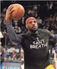  ?? ROBERT DEUTSCH/USA TODAY SPORTS ?? In 2014, LeBron James wore an “I Can't Breathe” T-shirt during a pregame warm-up.