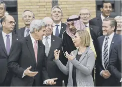  ??  ?? 0 John Kerry with Federica Mogherini and other representa­tives