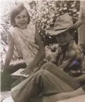  ?? COURTESY F. HARLAN FLINT ?? Tina Flint Smith sits with her brother Mason Flint in 1966.