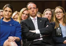  ?? DOUG MILLS / THE NEW YORK TIMES ?? Rod Rosenstein (center), the deputy attorney general, is expected to meet with the House Judiciary Committee in the next few weeks about allegation­s made against him in a New York Times article.