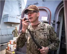  ??  ?? Stearney, speaks on the 1MC shipboard intercom to welcome the crew of the guided-missile destroyer USS Jason Dunham (DDG 109) to Manama in his file photo. — AFP photo