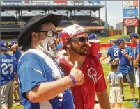  ?? JAMIE HARMS FOR ROUND ROCK LEADER ?? Cody (left) and Willie Braun pose after the softball portion of one of the Reckless Kelly Softball Jams at Dell Diamond. Sunday marks the final event of the series.