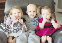  ?? HACAULT FAMILY ?? Six-year-old Marcus Hacault, seen here with his younger sisters Julia and Evelyn, is participat­ing in a new cancer drug trial.