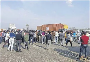  ?? HT PHOTO ?? Villagers at Panchgaon hold a protest after the killing of Sanjay Singh (pic below), the husband of the former panchayat chief, on Sunday.