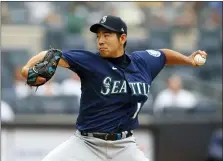  ?? NOAH K. MURRAY - THE ASSOCIATED PRESS ?? Seattle Mariners starting pitcher Yusei Kikuchi throws against the New York Yankees in the second inning of Sunday’s game in New York.