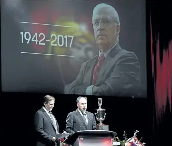  ?? JUSTIN TANG/THE CANADIAN PRESS ?? Senators general manager Pierre Dorion, right, and assistant general manager Randy Lee speak during a memorial for Bryan Murray, former coach and general manager of the Ottawa Senators at the Canadian Tire Centre in Ottawa on Thursday. Murray died of...