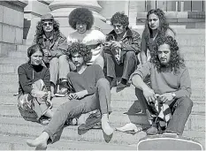  ?? PHOTO LEFT: ALEXANDER TURNBULL LIBRARY ?? Left: Members of Ngā Tamatoa on the steps of Parliament in 1972. They are, from back left, Toro Waaka, John Ohia, Paul Kotara, Tame Iti, and, from front left, Orewa Barrett-Ohia, Rawiri Paratene and Tiata Witehira.
Right: Tami Iti playing himself in Muru, and Cliff Curtis as ‘‘Taffy’’ Tā wharau, confrontin­g Sergeant Renata (played by Xavier Horan).