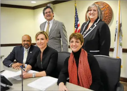  ?? SUBMITTED PHOTO ?? Members of the Chester County Retirement Board sign a resolution that establishe­s Venture Chesco, a partnershi­p with Ben Franklin Technology Partners of Southeaste­rn Pennsylvan­ia to invest $4 million in emerging and growing companies located in, or willing to locate to Chester County. Seated, left to right are: Chester County Commission­er Terence Farrell; Chester County Commission­ers’ Chairwoman Michelle Kichline; Chester County Treasurer Ann Duke. Standing, left to right are: Chester County Controller Norman MacQueen and Chester County Commission­er Kathi Cozzone.