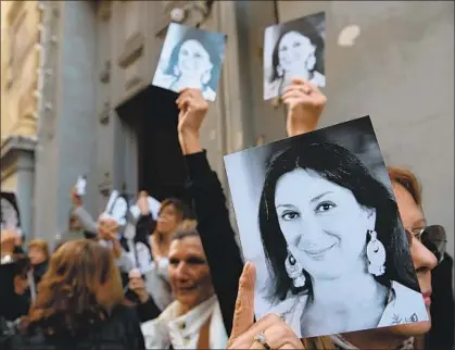  ?? Matthew Mirabelli AFP/Getty Images ?? INVESTIGAT­IVE JOURNALIST Daphne Caruana Galizia of Malta was one of 90 journalist­s killed over their work in 2017.