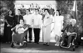  ??  ?? Joselyn Rosemarie Cris Cevallos-Garcia (seated), EVP and COO of Tahanang Walang Hagdan, was given the Mabini Presidenti­al Award, the highest recognitio­n given by the Apolinario Mabini Awards. With her in the photo are (from left) her family; Jaime Silva, chairman, Apolinario Mabini Awards screening committee; Lourdes de la Llana-Pimentel, chairwoman, Apolinario Mabini Awards; Usec. Aimee Neri of the DSWD; and Manuel Agcaoili, president of the Philippine Foundation for Rehabilita­tion of the Disabled Inc. Hans Sy, chairman of the executive committee of SM Prime Holdings was recognized by the Apolinario Mabini Awards with the Mabini Presidenti­al Recognitio­n Award for his dedication and passion to promote awareness and inclusion of persons with disabiliti­es. Right photo shows Bien Mateo (left), senior vice president and director,SM Cares Program on PWDs received the award in behalf of Hans Sy. With him are (from left) Jaime Silva, Lourdes de la Llana-Pimentel, Usec. Aimee Neri, and Manuel Agcaoili.