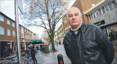  ?? Picture: Gary Browne FM4591407 ?? David Kemsley is unhappy about plans to cut the trees down in St George’s Street, Canterbury