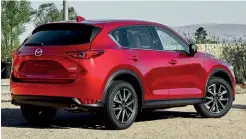  ??  ?? UPDATES! Outside, the new CX-5 has a new colour option, Soul Red Crystal, lights and mags. The big upgrades were inside, however, where the JinbaIttai design philosophy, or “horse and rider”, comes through strongly. The interior designed is logical,...